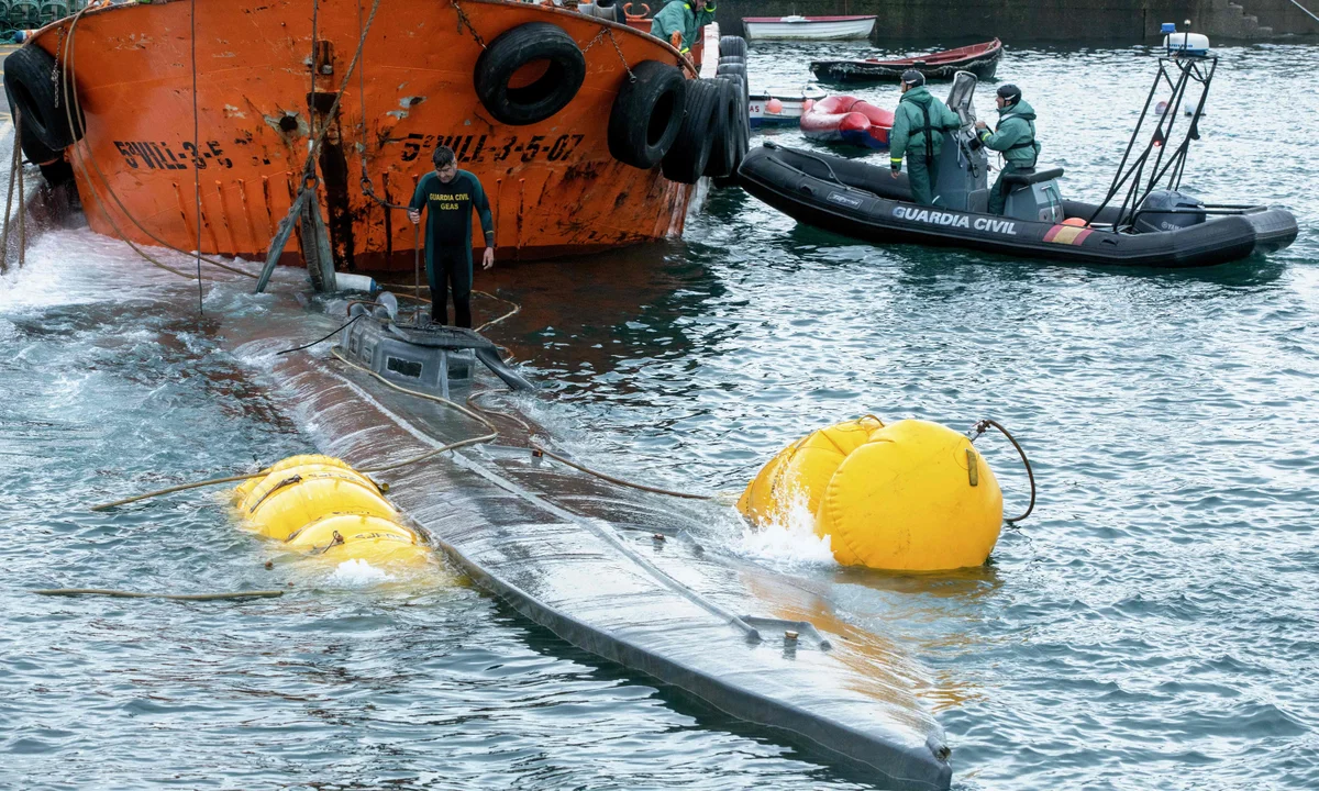 Spanish police report drug traffickers now reuse narco-submarines due to plummeting cocaine prices, while synthetic drug labs rise across Spain and Europe.