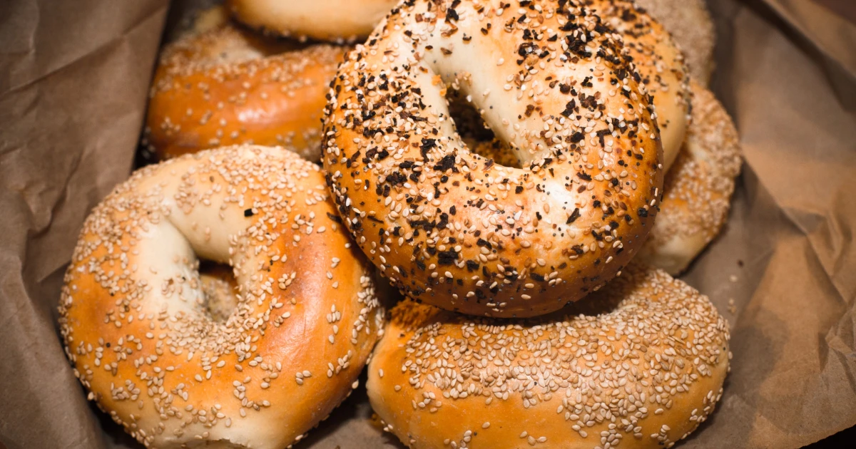 Celebrate National Bagel Day 2026 with free bagels and special offers from Einstein Bros., Panera, Bruegger’s, H&H Bagels, and local bakeries.