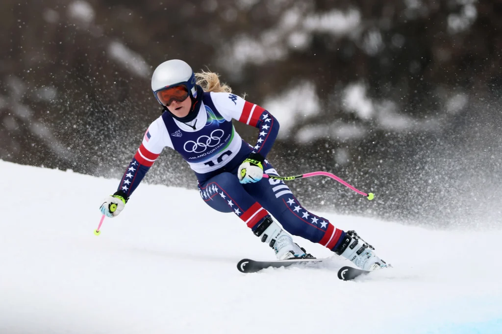 Lindsey Vonn crashes 13 seconds into Cortina downhill, ending her Olympic medal bid just nine days after rupturing her ACL.