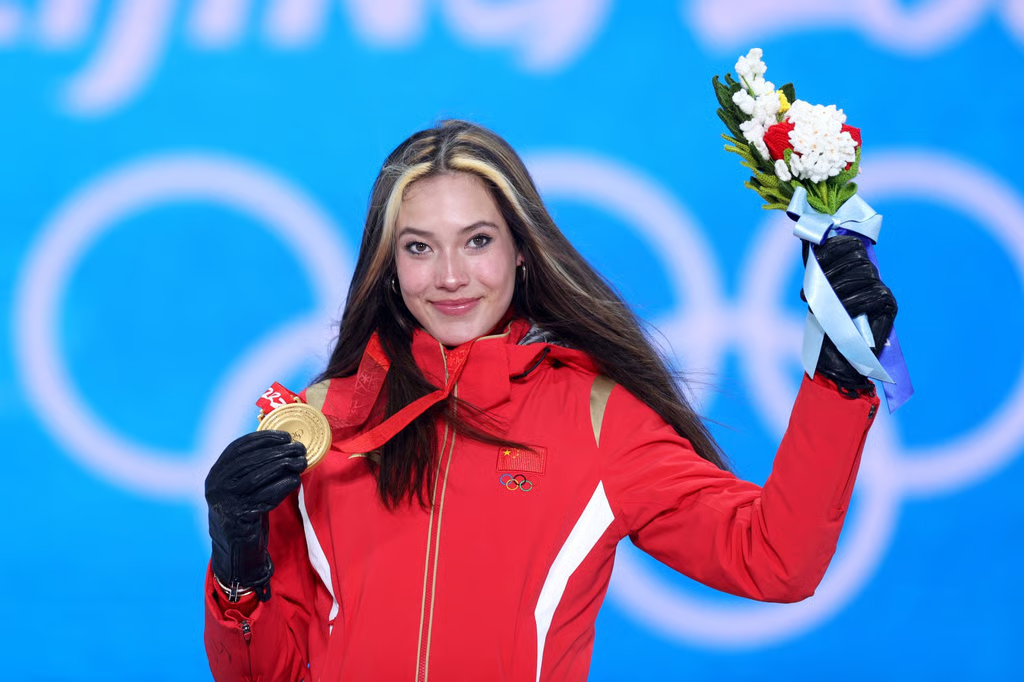 Eileen Gu heads into the Milan-Cortina 2026 Winter Olympics as China’s top star, with renewed focus on her achievements amid ongoing passport questions.