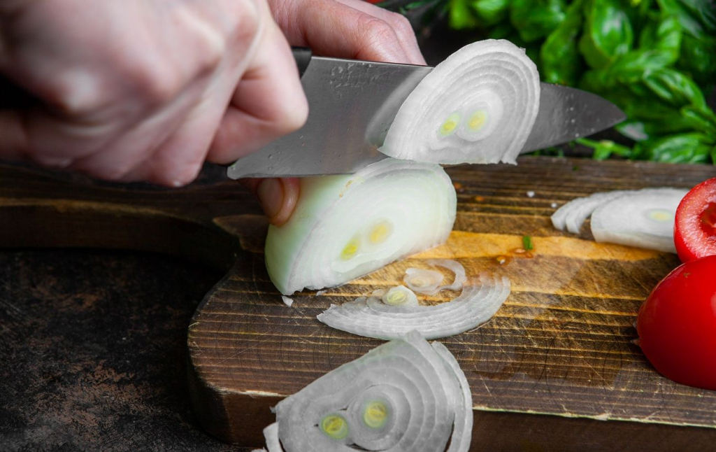 How to cut onions without crying using proven chef techniques and scientific hacks. Learn about chilling, knife sharpening, and ventilation for a better kitchen.