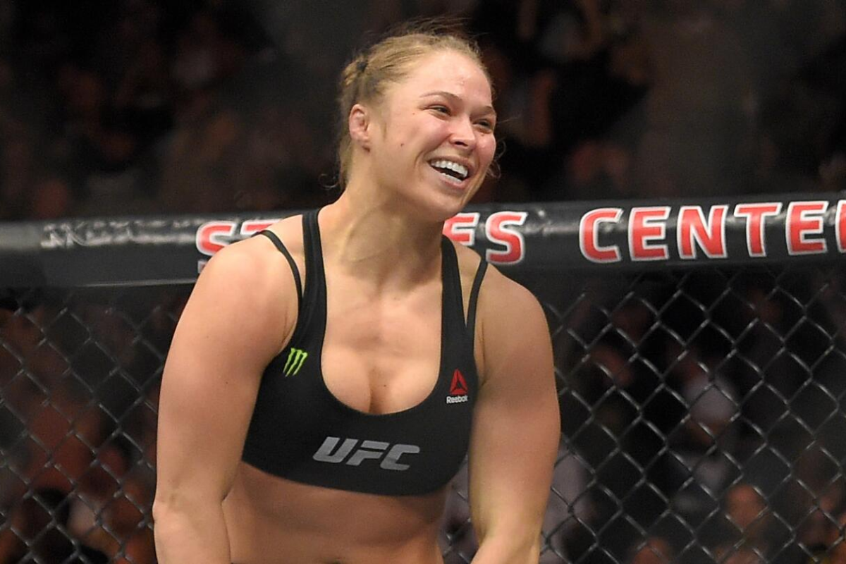 Ronda Rousey returns to MMA against Gina Carano on May 16 at Intuit Dome. Historic matchup streamed live on Netflix, marking a decade since Rousey’s last fight.