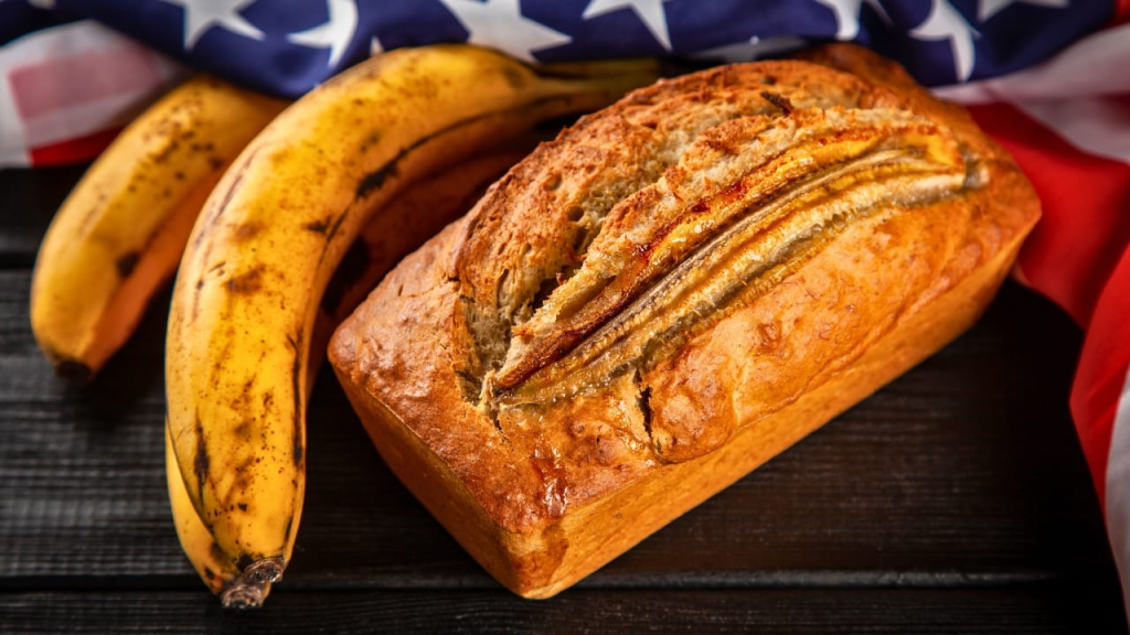 Banana bread recipe and history. Discover how to use simple pantry staples to create a delicious and moist American quick bread that everyone will love.