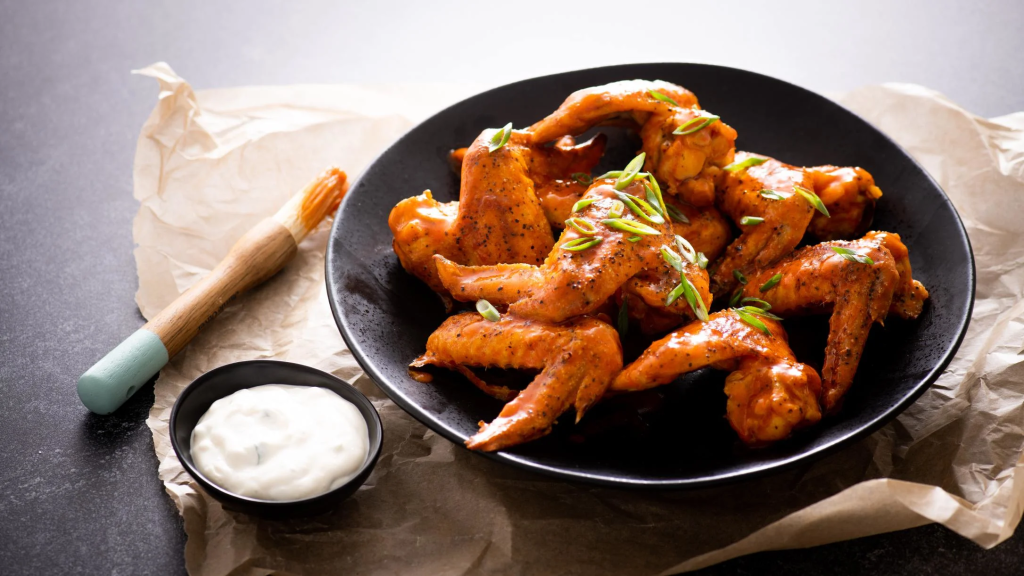 How to cook Buffalo chicken wings: Professional recipe for crispy and spicy chicken wings with details on the authentic sauce and frying methods for 2026.