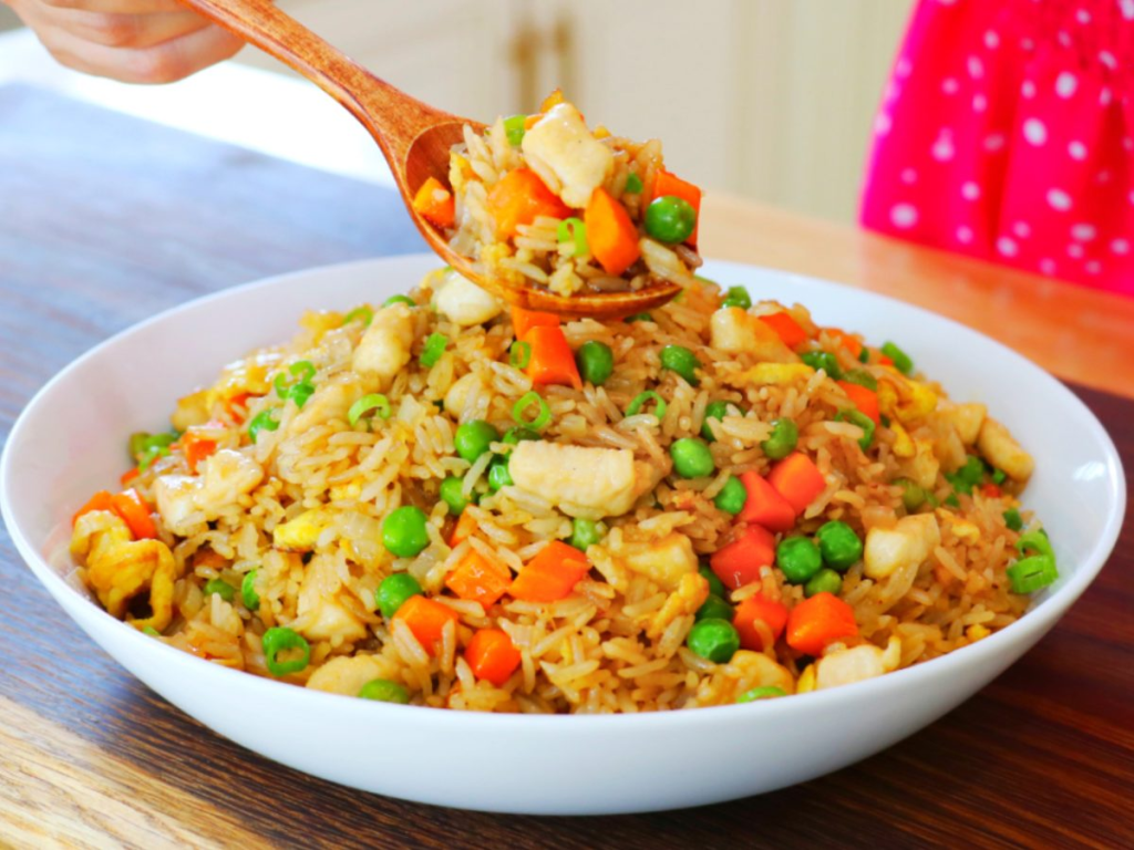 Make restaurant-quality fried rice at home with this easy recipe. Day-old rice, simple sauce, and high heat create the perfect fried rice in 15 minutes.