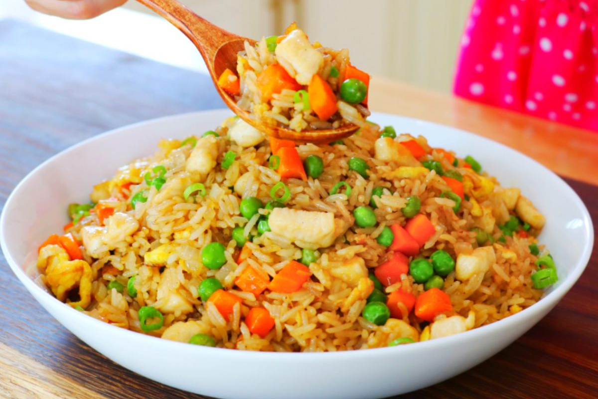 Make restaurant-quality fried rice at home with this easy recipe. Day-old rice, simple sauce, and high heat create the perfect fried rice in 15 minutes.