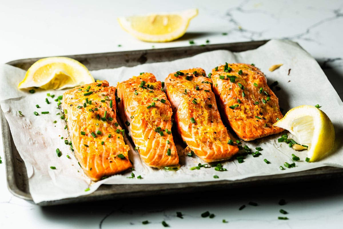 Bake perfect salmon every time with this oven method. Exact temperature, timing, and seasoning for flaky, moist salmon fillets in under 20 minutes.