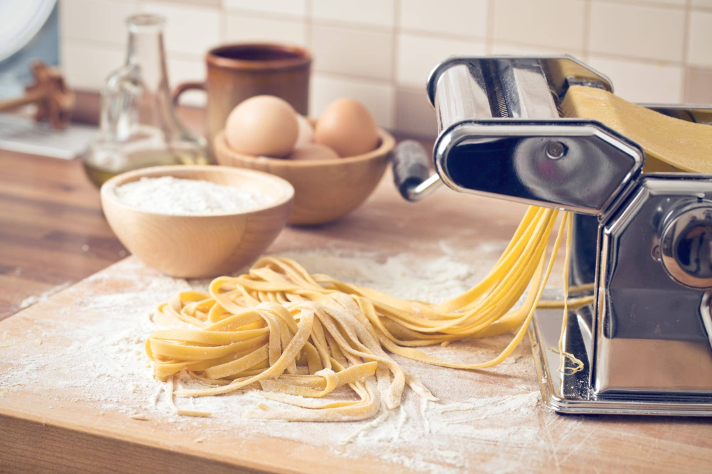 Make fresh homemade pasta from scratch with just flour and eggs. Step-by-step guide to rolling, cutting, and cooking for authentic Italian taste.