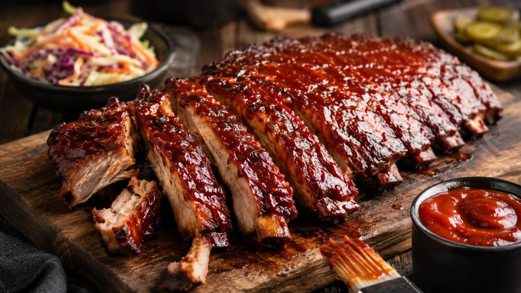 Learn how to cook juicy BBQ ribs at home with a rich homemade sauce, slow oven method, marinade tips, and smoky barbecue flavor without a smoker.