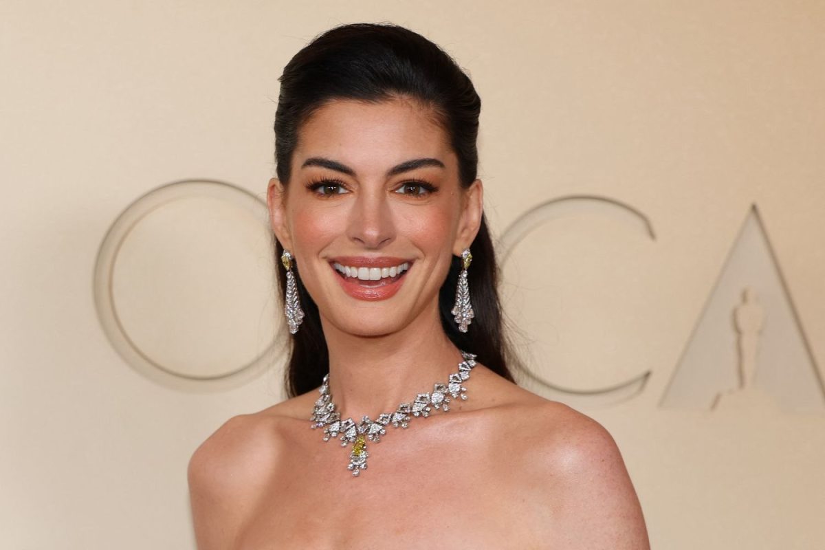 Anne Hathaway pregnant with 3rd child after revealing her baby bump in an Instagram video. The actress shares 2 sons with Adam Shulman.