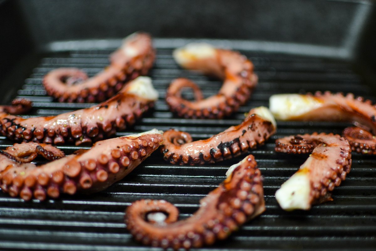 How to clean and cook octopus at home: learn safe cleaning, tender simmering, grilling times, storage rules, and methods that prevent rubbery seafood.