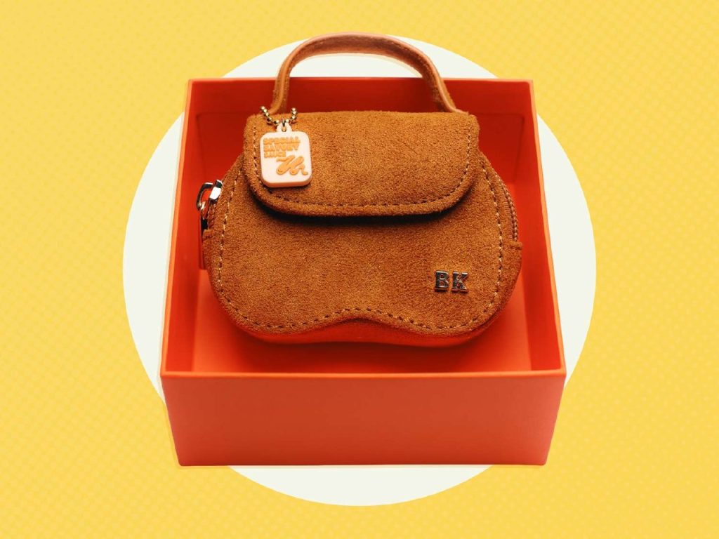 Burger King Le Nugguette is a $3.99 chicken nugget-shaped micro bag with a sauce charm and four-piece nugget code, limited to 100 daily.