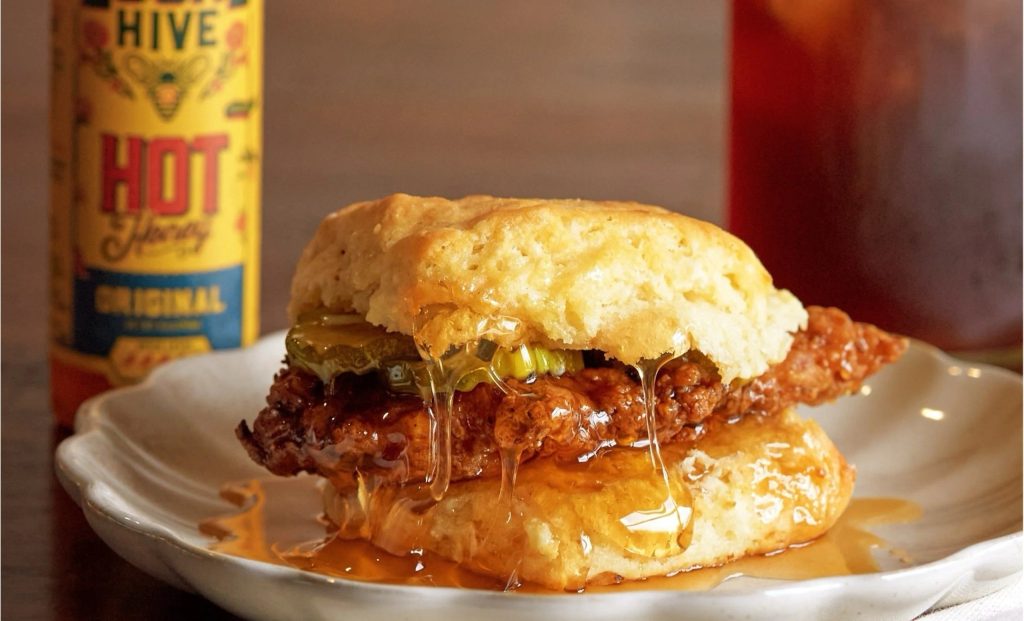 Popeyes Honey Chicken Biscuit launches nationwide on September 28 for $5, combining fried chicken, a large buttermilk biscuit and sweet honey sauce.